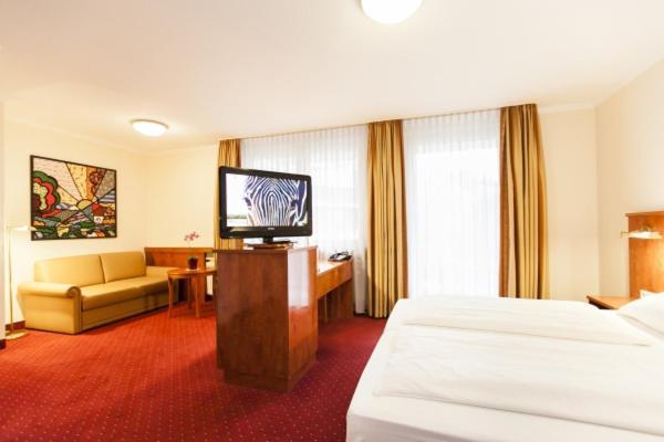 Hotel Am Berliner Platz Ланґенфельд Номер фото